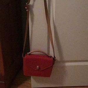 Frances Valentine red patent leather cross body bag.